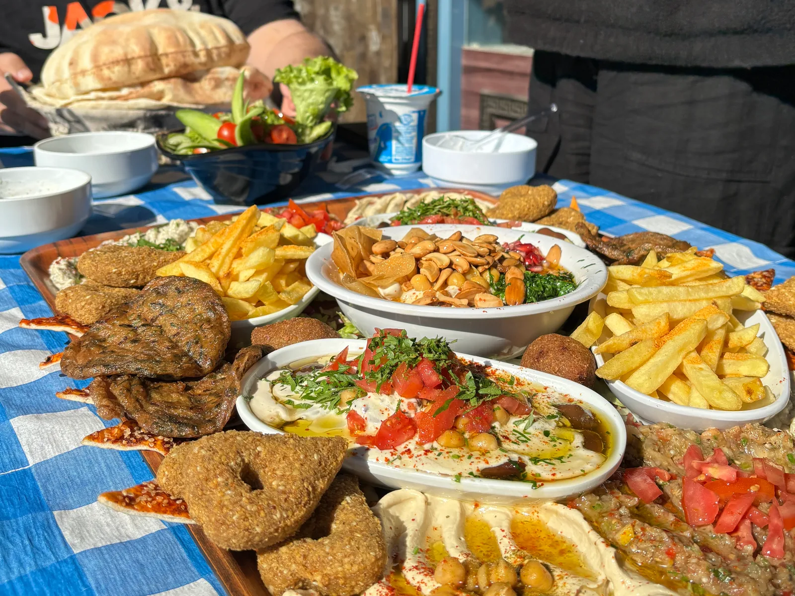 Syrian breakfast on a large wooden platter