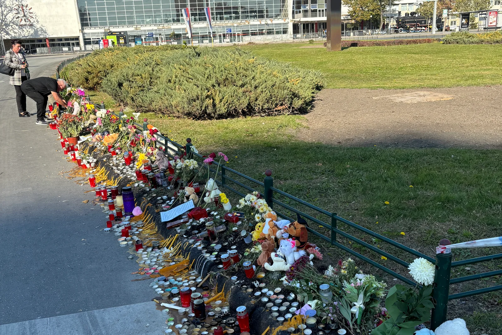 Memorial flowers beside the station